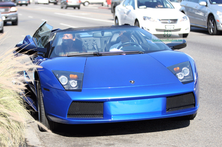  California in her electric blue Lamborghini on Tuesday