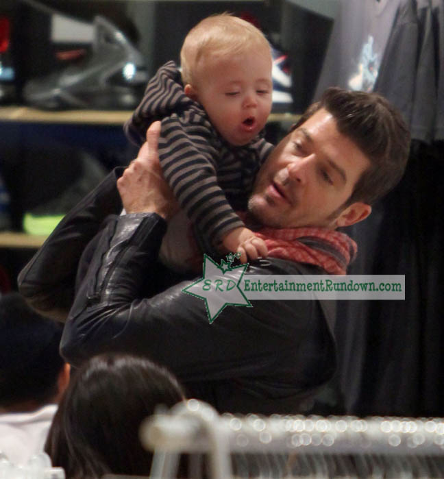 robin thicke paula patton baby. Singer Robin Thicke and his