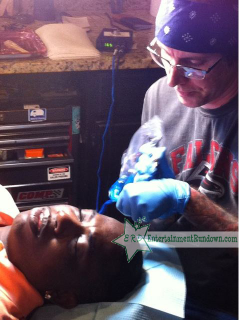 gucci tattoo on face. getting a face tattoo of